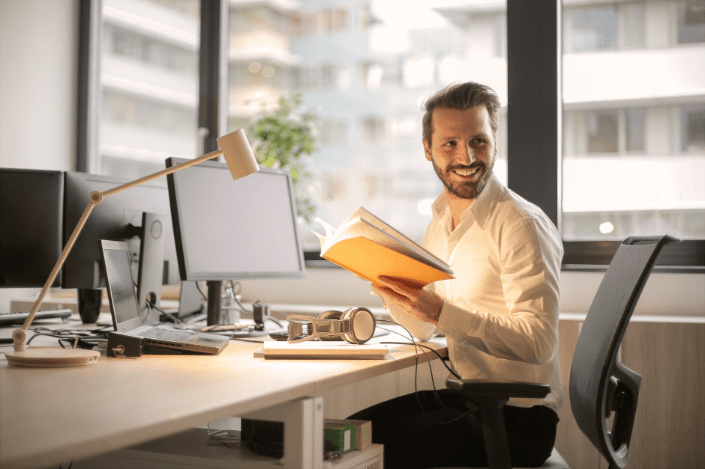 a worker sitting on his desk